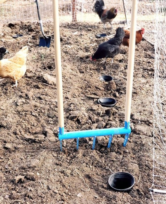 The Cultivator Treadlite Broadfork is an easy to use tool for soil aeration and cultivation and bonus it does not disturb the chickens so they can team the soil aeration
