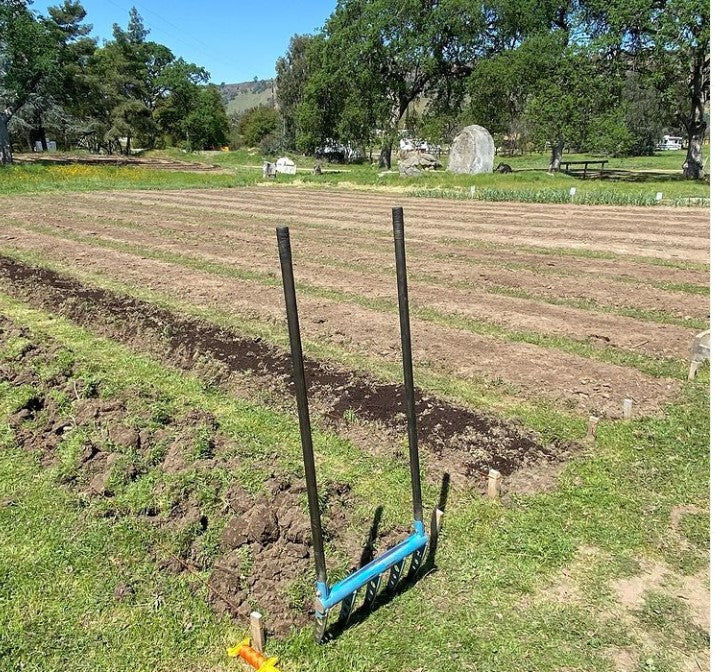 The 5 tine Cultivator Treadlite Broadfork breaking new ground for garden beds at Harvest Fields Organic Farm in California